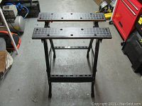 Full frontal photo of the Jobmate work table showing the frame and top panels.