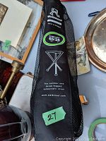 Photo of the carrying bag showing Walkstool branding, comfort height label 65 cm / 26 inches, and product illustration