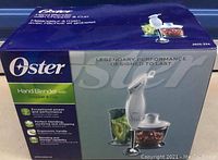 Box showing brand and features of the Oster hand blender with chopper and cup