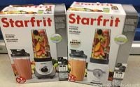 Front of two Starfrit personal blender boxes showing branding, new design, and smoothie images.