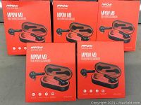 Five unopened red Mpow M9 True Wireless Earbuds boxes