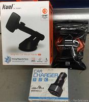 Magnetic car mount holder box, USB car charger box, Sealight LED headlights package shown together.
