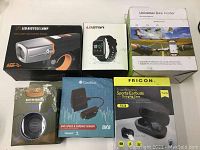 Photo of all five items' boxes together showing brand and product type