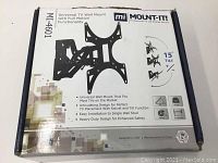 Box of Mount-IT! Universal TV Wall Mount MI-4601 showing tilt angle information and features.