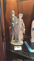 Front view of Lladro figurine depicting older couple