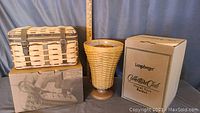Floral vase basket with original box and trunk basket with original box and protector shown with measuring stick