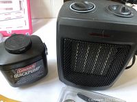 Coleman Quick Pump and black ceramic heater shown side by side