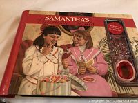 Photo of the Samantha's Valentine Crafts book showing the vintage cover with two girls crafting and including supplies for 6 crafts.