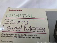 Close-up of the RadioShack Digital Sound Level Meter box showing product name and details.