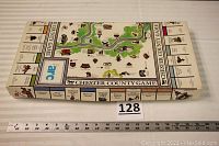 Closed game box showing Chester County Game title and ARC logo, with ruler for scale.