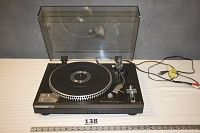 Full view of Kenwood KD-3070 turntable with dust cover open, showing platter and tonearm.