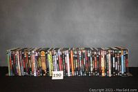 Long row of DVD cases on a shelf with placeholder card ‘190’.