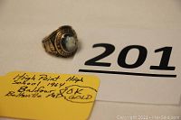 Ring positioned next to lot number and seller note