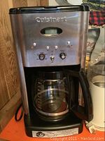 Front view of Cuisinart programmable coffee maker showing carafe and control panel