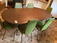 Full set showing table and six chairs