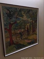 Angled view of framed painting on wall