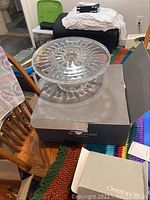 Waterford crystal cake stand on original box showing cut starburst design