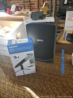 Primary view of Samson XP106 speaker and boxed XPD1 microphone kit with power adapter