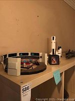 Shows Starship Enterprise bridge model with control panels and seats