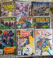 Lot of 10 Marvel comic books showing covers of The Uncanny X-Men, Ghost Rider, Hulk and others.