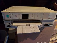 Epson Artisan 725 front view showing control panel and paper trays.