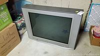 Side and front angled view of Sony Trinitron CRT TV showing screen and casing.