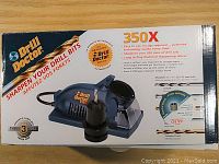 Photo of the Drill Doctor 350X drill bit sharpener box front showing product image and features.