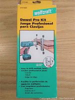 Front of box displaying product name, usage examples, and basic features in English and Spanish.