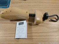 Dasco Two Way Shoe Stretcher flat on table with brand card visible.