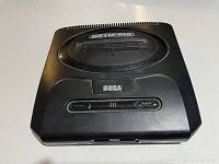 Top view of Sega Genesis Model 2 console showing cartridge slot and controls