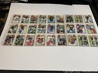 Top side of 27 varied 1979 Topps NFL football cards showing different player portraits and action images arranged in rows.