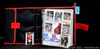 Open Chicago Bulls binder showing multiple pages of basketball cards, front view of binder cover with Chicago Bulls logo patch, and close-up open binder with player basketball cards.