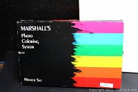 Front view of the Marshall's Photo Coloring System Master Set box with colorful stripe design and text.