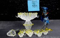 Full set display of hand-blown glass Donald Duck figurine and punch bowl set with seven cups and server