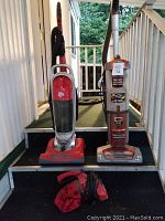 Three vacuums shown side by side on steps: Dirt Devil upright, Dirt Devil handheld, and Shark Rocket upright vacuum