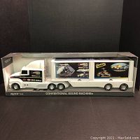 Front view of the boxed Nylint Conventional Sound Machine toy truck showing the semi-truck and trailer inside the original box with clear window.
