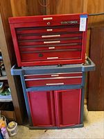 Full view of red Task Force tool chest top and matching bottom cabinet