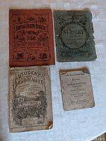 Four 19th century children's magazines and booklets arranged on a white surface, showing age wear and varying sizes.
