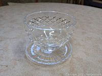 Side angle photo of the Waterford crystal footed dessert bowl showing crosshatch cut pattern and sunburst base.