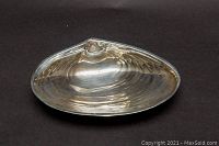 Top view of shell-shaped bowl showing interior ribbing and scalloped rim