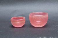 Two bowls side by side on dark background showing front profiles and color.