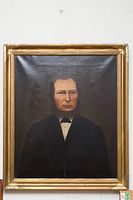 Full view of the antique oil on canvas portrait in gold frame, showing overall condition and canvas creasing.