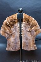 Front view of vintage mink fur stole showing plush brown fur and well-shaped collar.
