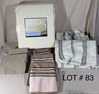 Full bedding set including new cotton quilt and sheets with pillowcases