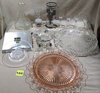 Full set including 2 platters, bowl, Mikasa plate, carafe, 4 wine glasses, candle holder spread on table