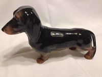Side view of Beswick Dachshund figurine showing body and head profile