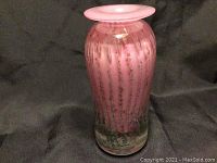 Front view of the pink art glass vase showing overall shape and gold fleck pattern