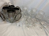Image showing full set including 4 lustreware glasses, glass coasters inside silver wire caddy, and some loose glasses