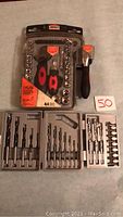 View showing the full 44-piece socket set kit including two ratchet handles and various sized sockets.