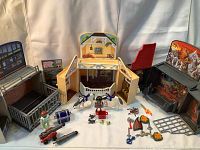 Three PlayMobil My Secret Play Boxes displayed with small figures, two white horses, weapons, and small accessories. The Dragons Lair on right side with cage, the Horse Stable front and center with fence gate, and the Police Station on left with jail door.